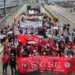 Trabajadores centroamericanos marchan por las calles en su día